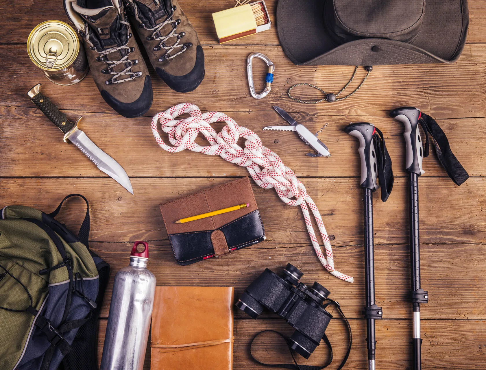 Trekking backpack, poles, and trail shoes prepared for a Sa Pa hike